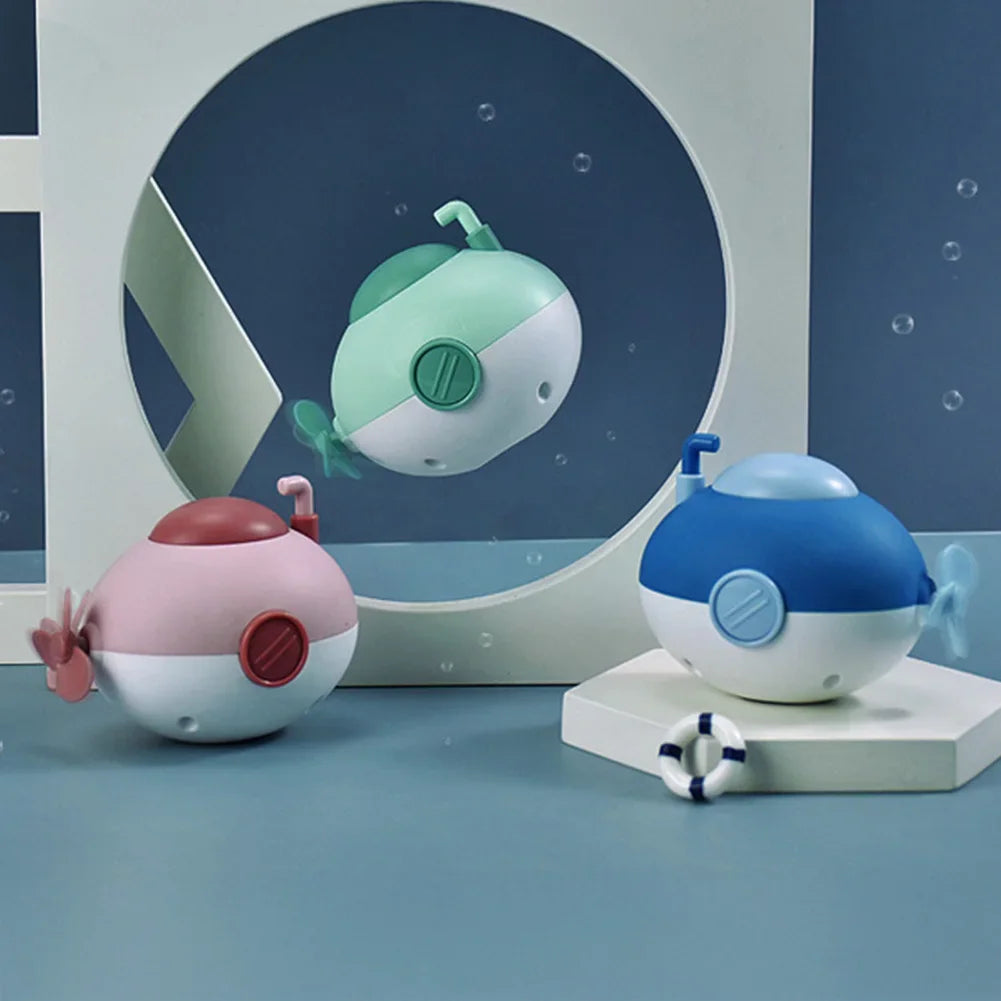 Baby takes a bath and plays in the water, Submarine, winding up animal chain, playing in the bathroom, children's toys