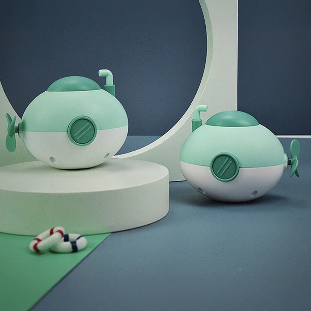 Baby takes a bath and plays in the water, Submarine, winding up animal chain, playing in the bathroom, children's toys