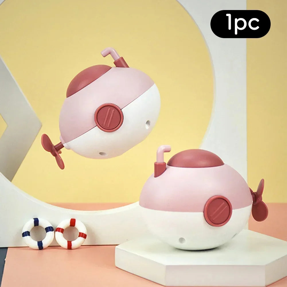 Baby takes a bath and plays in the water, Submarine, winding up animal chain, playing in the bathroom, children's toys