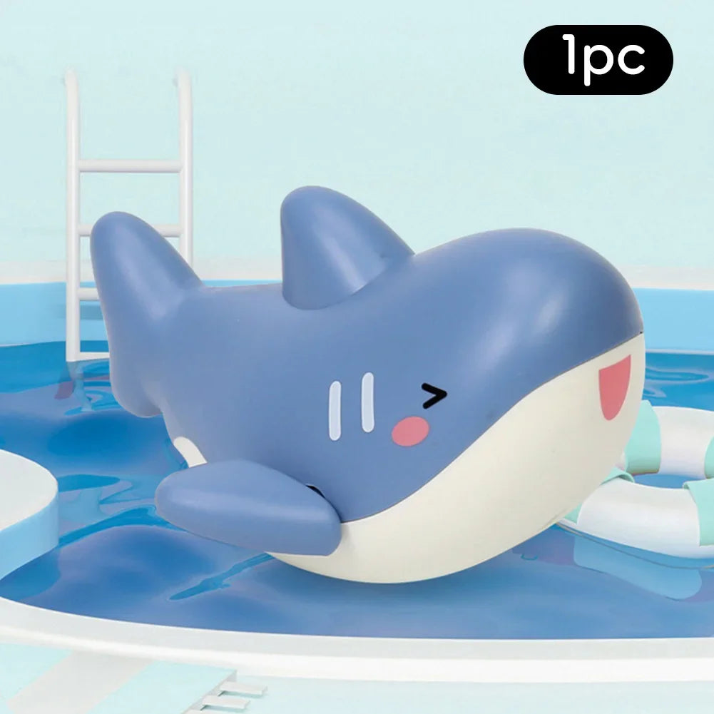 Baby takes a bath and plays in the water, Submarine, winding up animal chain, playing in the bathroom, children's toys