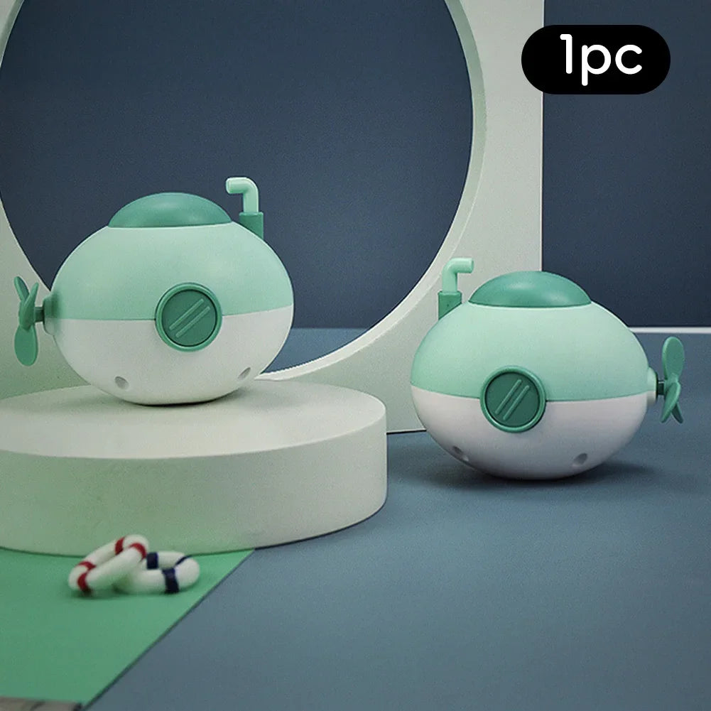 Baby takes a bath and plays in the water, Submarine, winding up animal chain, playing in the bathroom, children's toys